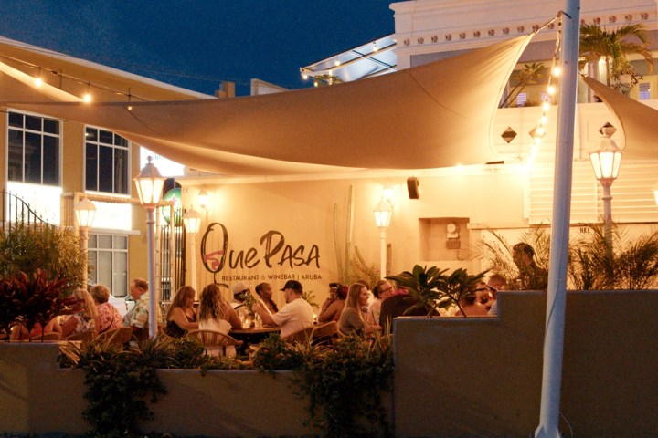 a group of people standing in front of a building
