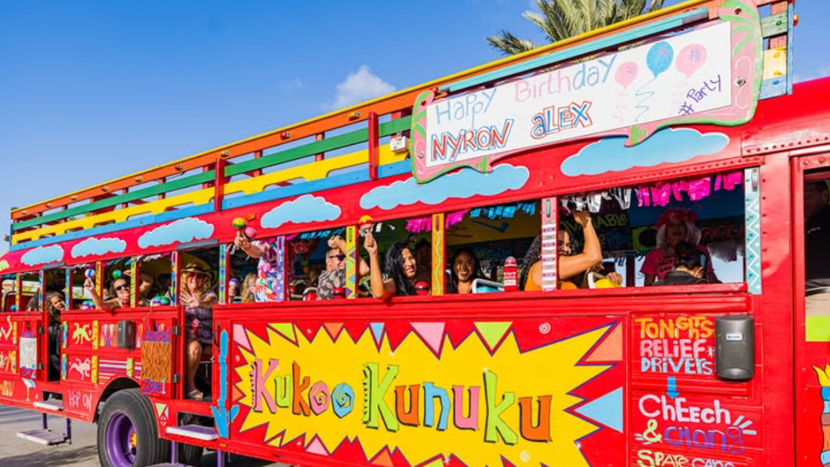 a double decker bus parked on the side of a road