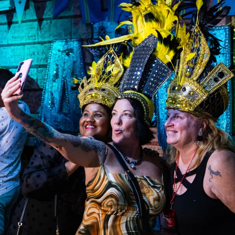 a group of people standing in front of a building