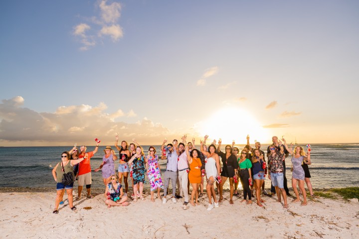 a group of people on a beach