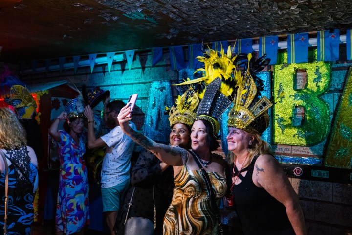 a group of people standing in front of a building